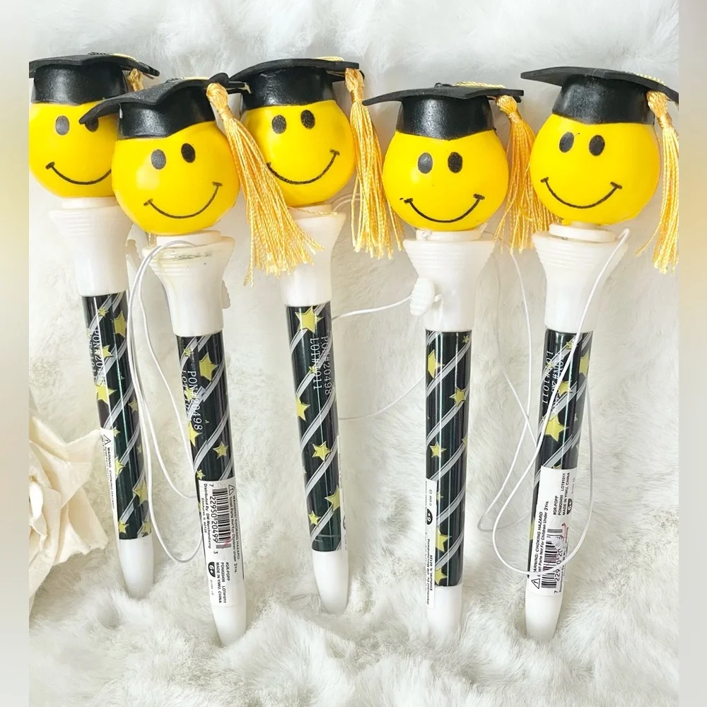 New with tags SPRING LOADED GRADUATION POP OFFS Set of 5. GRAD CAP with TASSEL